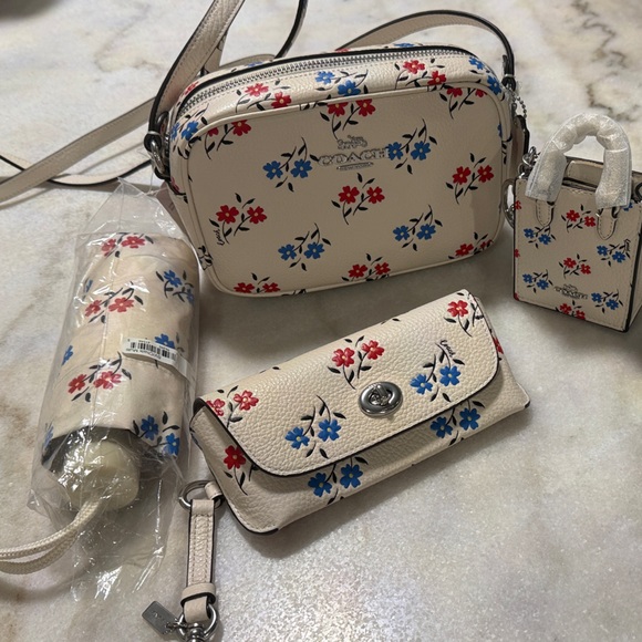 Coach Cream Crossbody Bag with Red and Blue Floral Design - Picture 1 of 5